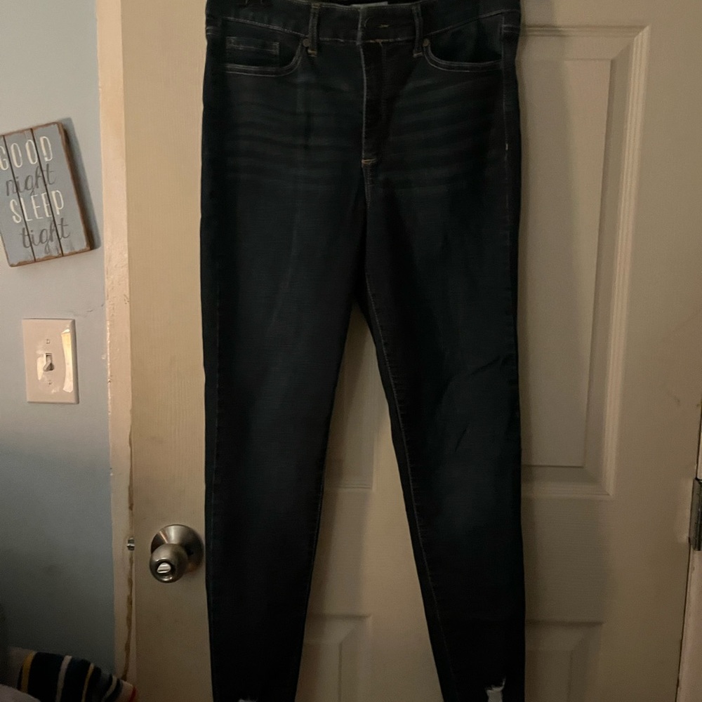 Sofia Jeans, distressed only at skinny bottoms.